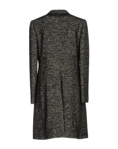 Shop Dolce & Gabbana Coats In Black