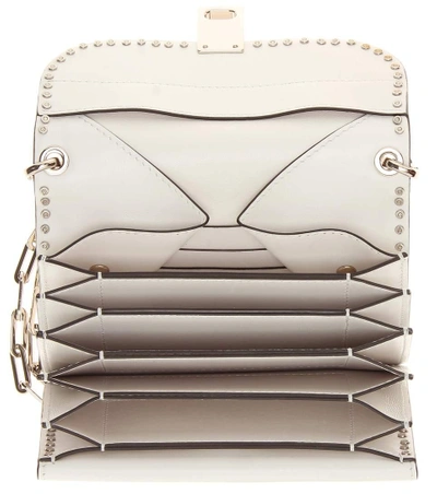 Shop Valentino Loveblade Leather Crossbody Bag In White
