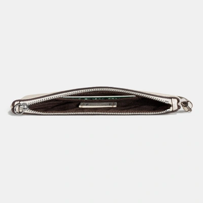 Coach Small Wristlet In Grain Leather With Souvenir Embroidery In Dark Gunmetal/chalk