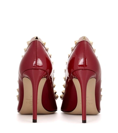 Shop Valentino Rockstud Patent Leather Pumps In Red