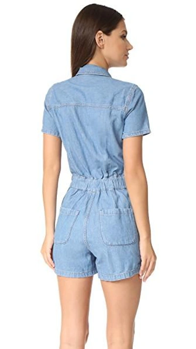 Shop Madewell Denim Zip Romper In Blue Denim