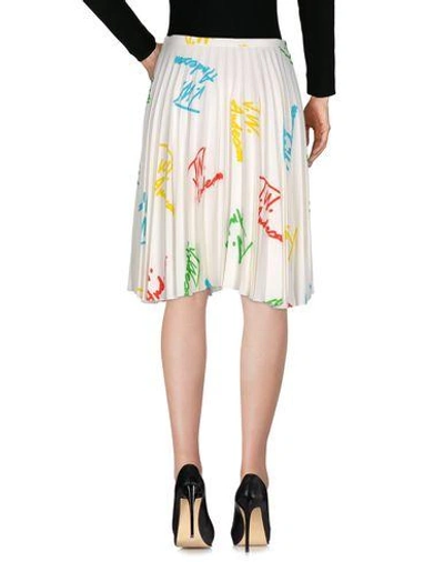 Shop Jw Anderson Knee Length Skirts In Ivory