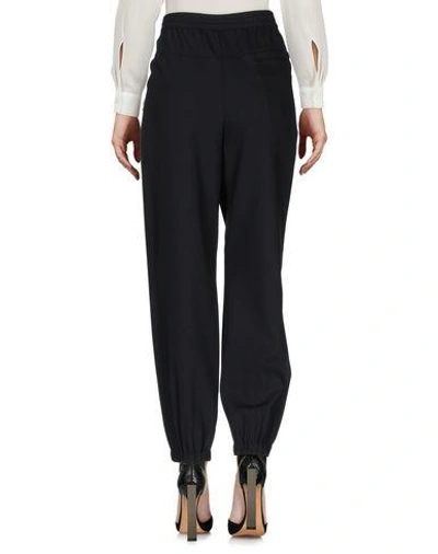 Shop Prada Casual Pants In Black