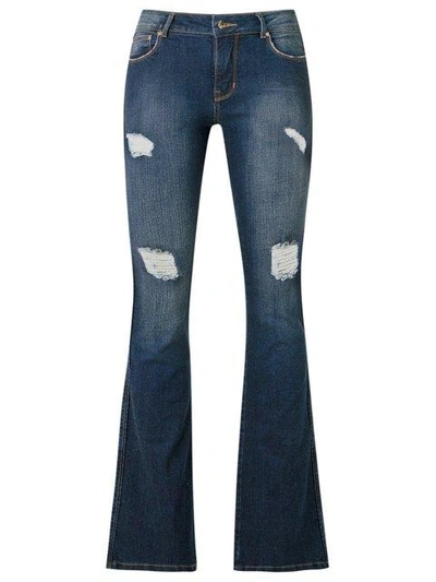 Shop Amapô Distressed Flared Jeans In Blue