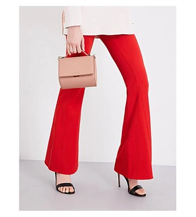 Shop Givenchy Flared Mid-rise Woven Trousers In Red