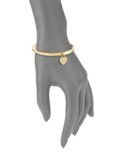 Shop Michael Kors Heritage Logo Heart Charm Bangle Bracelet/goldtone