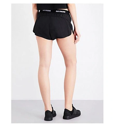 Shop Ivy Park Logo-trim Shell Running Shorts In Black