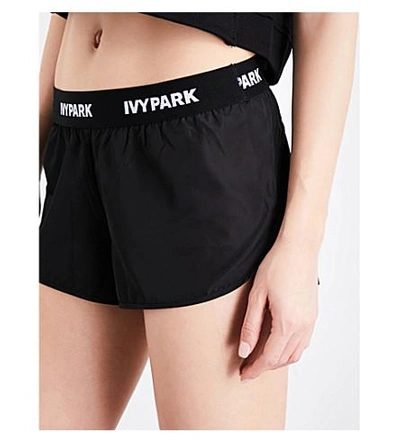 Shop Ivy Park Logo-trim Shell Running Shorts In Black