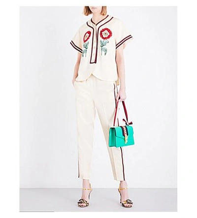 Shop Gucci Cropped Satin Trousers In Beige