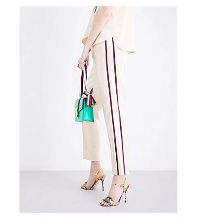 Shop Gucci Cropped Satin Trousers In Beige