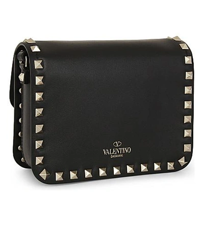 Shop Valentino Rockstud Leather Cross-body Bag In Black