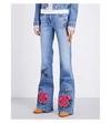  W25 flared mid-rise jeans