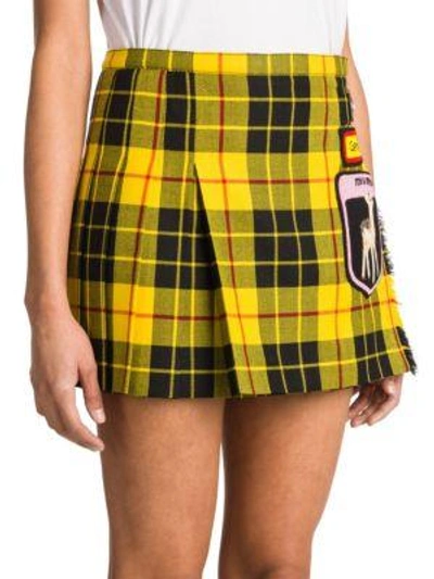 Shop Miu Miu Pleated Tartan Wool Patched Mini Skirt In Yellow Black