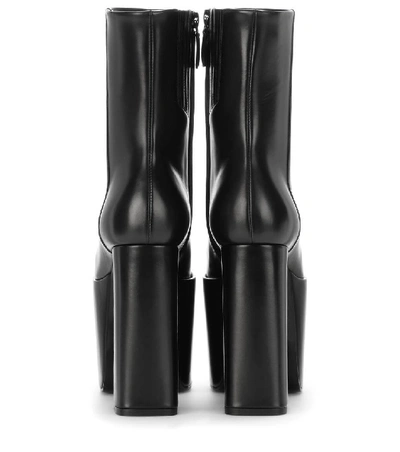 Shop Balenciaga Leather Platform Ankle Boots In Black