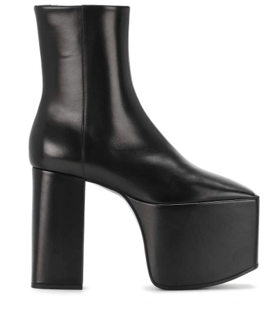 Shop Balenciaga Leather Platform Ankle Boots In Black