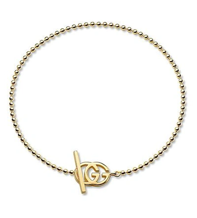 Shop Gucci Brand-motif 18ct Yellow-gold Bracelet In Yellow Gold