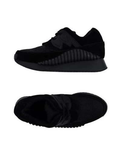 Shop Underground Sneakers In Black