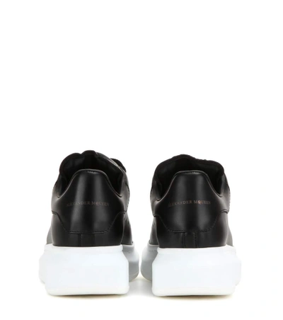 Shop Alexander Mcqueen Leather Sneakers In Black