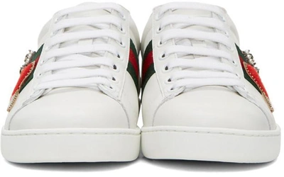 Shop Gucci White Pierced Heart Ace Trainers