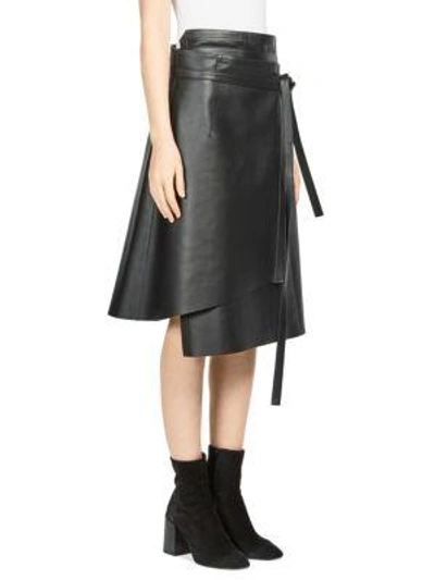 Shop Acne Studios Lakos Leather Wrap Skirt In Black