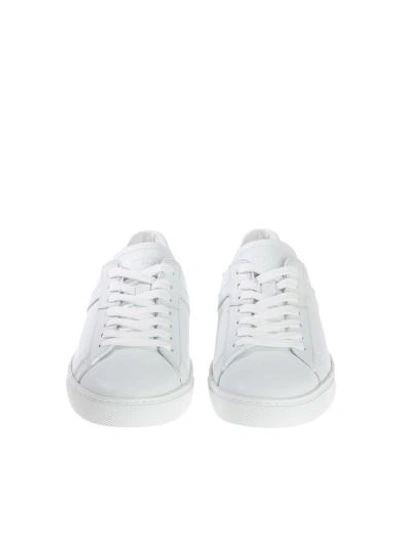 Shop Tod's Studded Sneakers In White