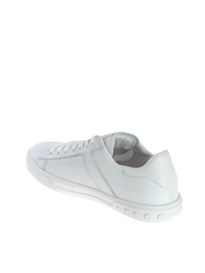 Shop Tod's Studded Sneakers In White