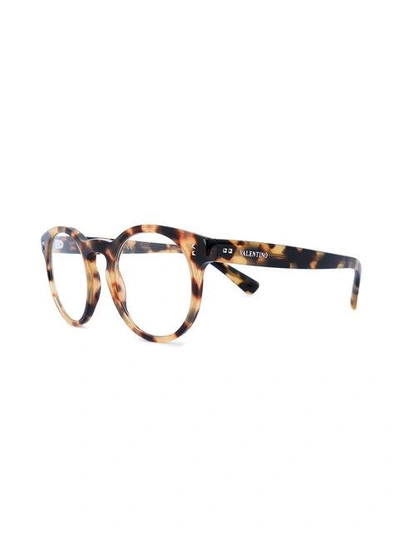 Shop Valentino Garavani Rockstud Round Frame Sunglasses