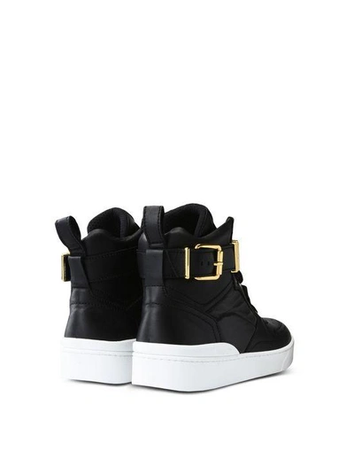 Shop Moschino Sneakers In Black