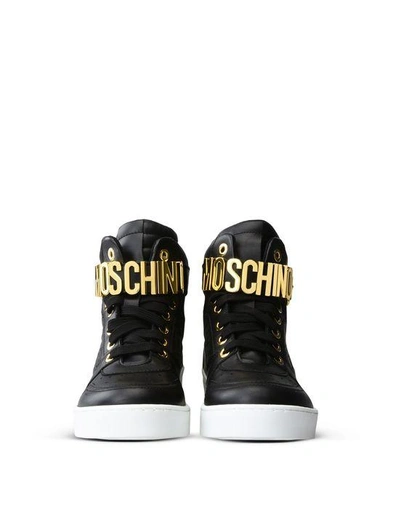 Shop Moschino Sneakers In Black