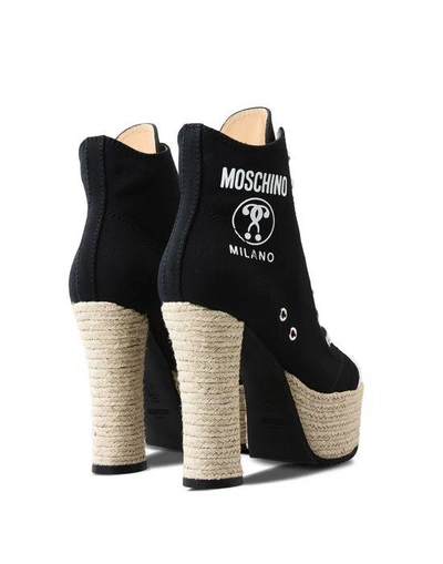 Shop Moschino Heel In Black