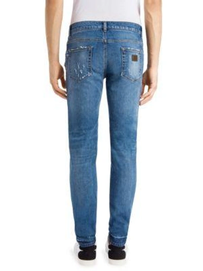 Shop Dolce & Gabbana Slight Distressed Slim-fit Jeans In Blue