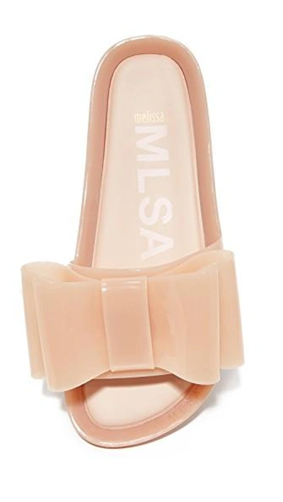 Shop Melissa Bow Beach Slides In Light Pink Matte