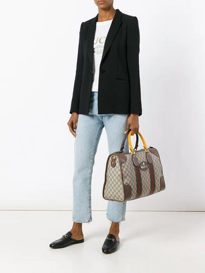 Gucci Brown GG Supreme Travel Bag Black Beige Leather Cloth Pony-style  calfskin Cloth ref.330881 - Joli Closet