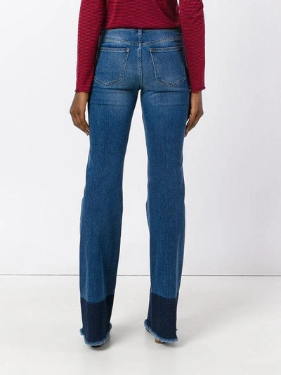 Shop Red Valentino Frayed Bootcut Jeans - Blue