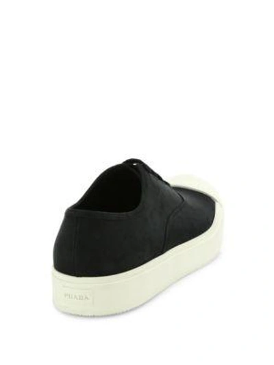 Shop Prada Nubuck Cap Toe Sneakers In Black
