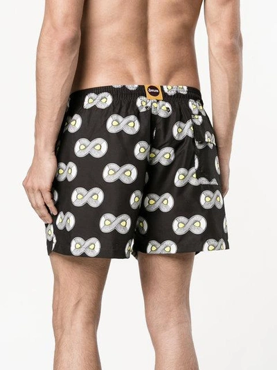 Shop Okun Ali Oju Print Swim Shorts