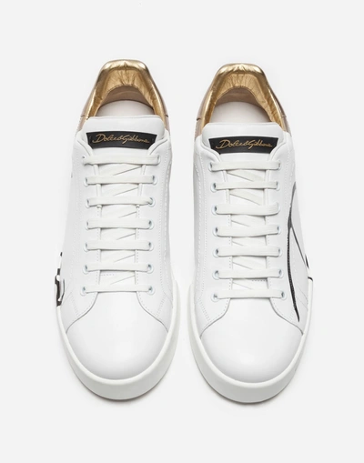 Shop Dolce & Gabbana Portofino Sneakers In Leather And Patent In White/gold