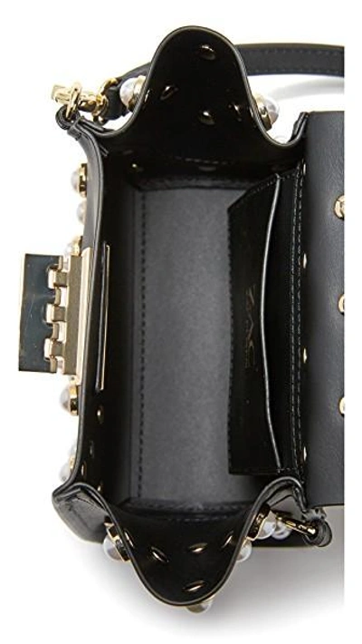 Shop Zac Zac Posen Eartha Imitation Pearl Top Handle Mini Cross Body Bag In Black