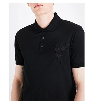 Shop Alexander Mcqueen Stallion-embroidered Cotton Polo Shirt In Black