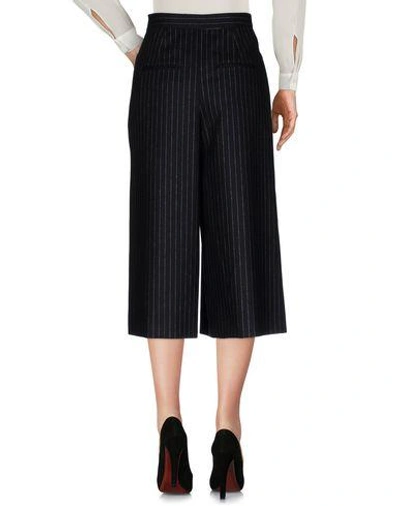 Shop Saint Laurent Cropped Pants & Culottes In Black