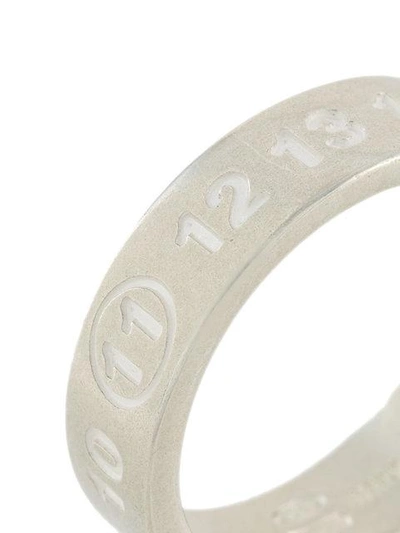 Shop Maison Margiela Logo Embossed Ring - Metallic