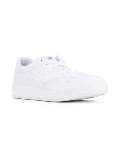 Shop New Balance - 300 Canvas Sneakers  In White