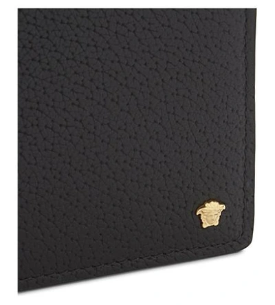 Shop Versace Medusa Leather Billfold Wallet In Black Gold