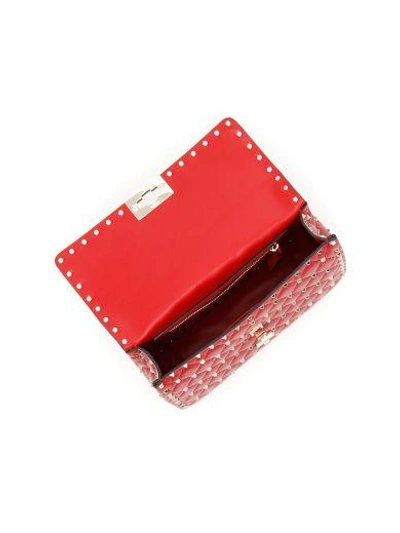 Shop Valentino Medium Spike Rockstud Bag In Rosso|rosso