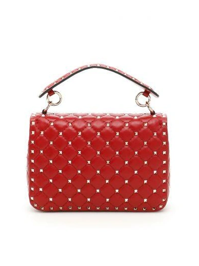 Shop Valentino Medium Spike Rockstud Bag In Rosso|rosso