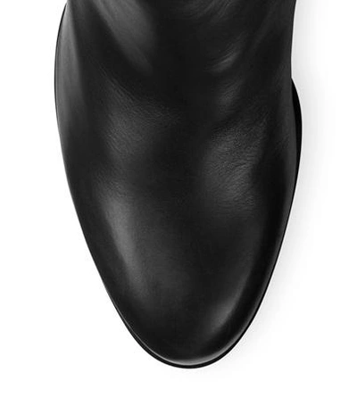 Shop Stuart Weitzman The Sidemover Bootie In Black Calf Leather