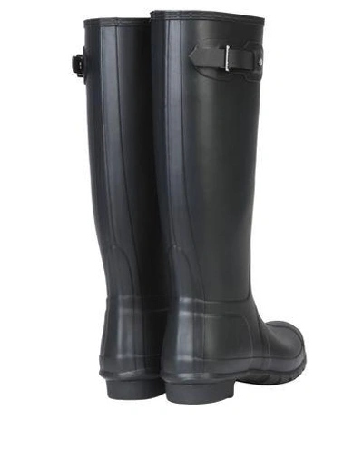 Shop Hunter Knee Boots In Black