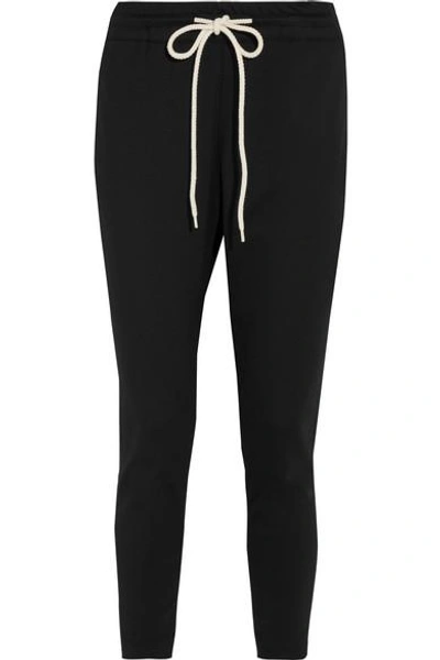 Shop Bassike Cropped Cotton-blend Jersey Track Pants In Black