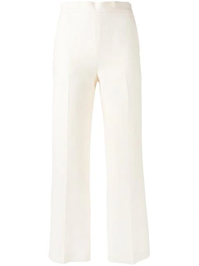 Shop Fendi Cropped Flared Trousers In White