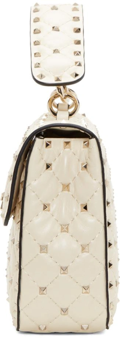 Shop Valentino Ivory  Garavani Medium Rockstud Spike Chain Bag